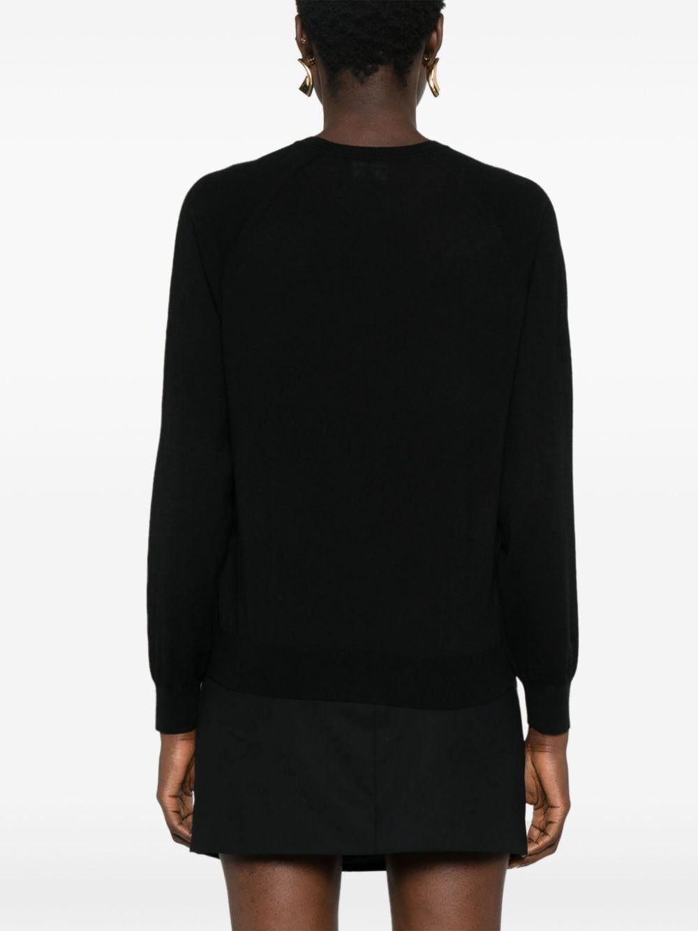 Maglione nero con mini loghi strass