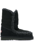 Stivali neri foderati in shearling