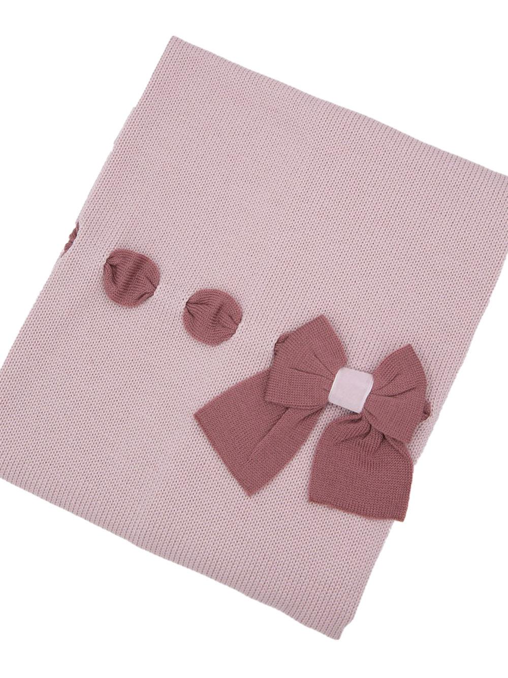 Coperta in maglia rosa con fiocco
