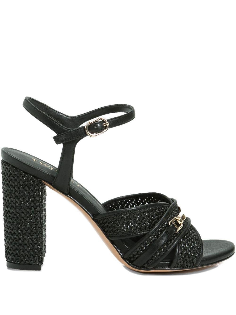 Sandalo nero in rafia intrecciato