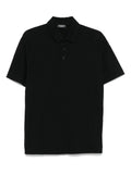Polo nera in tessuto cotone