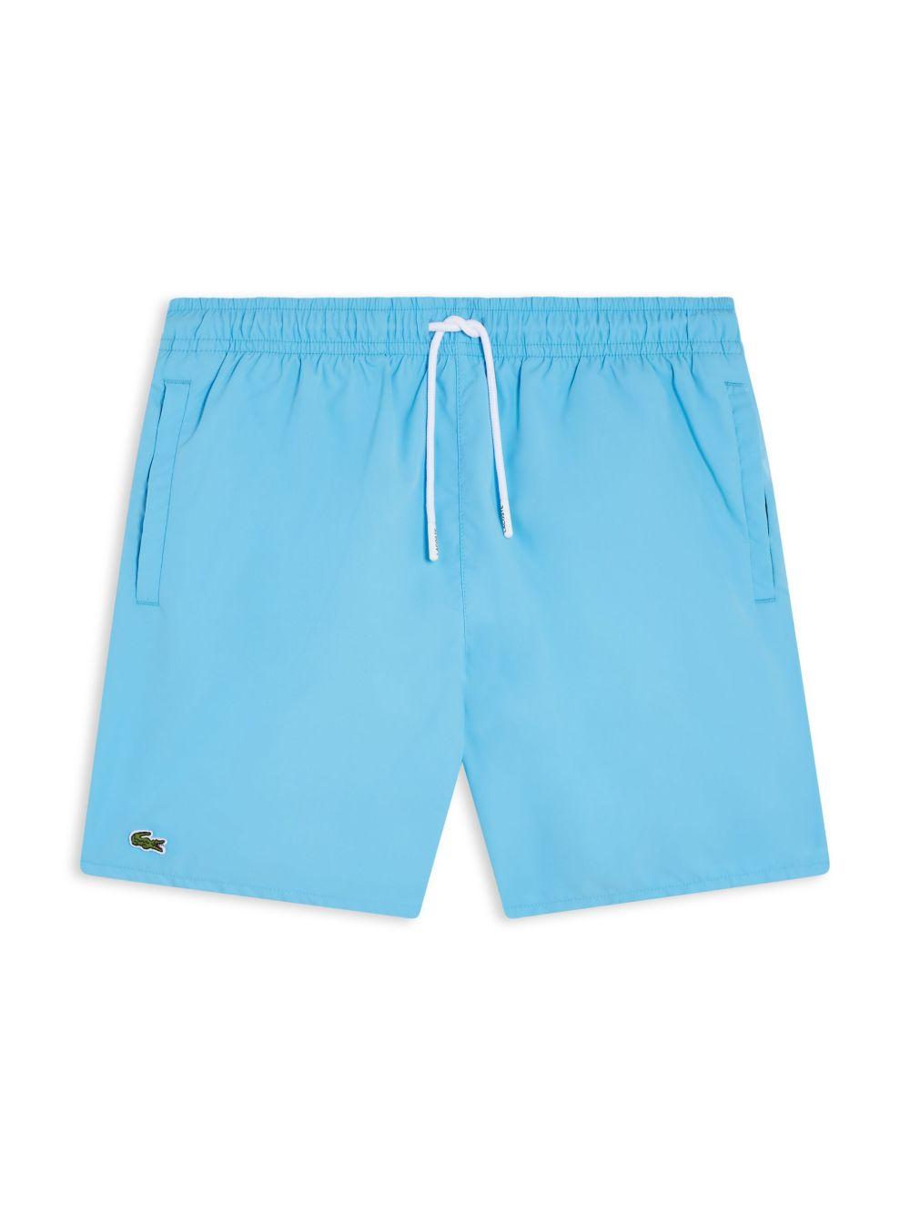 Costume azzurro tinta unita MJ4756 INI LACOSTE KIDS 