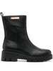 Stivaletto nero con placchetta logo laterale