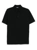 Black polo shirt in cotton fabric