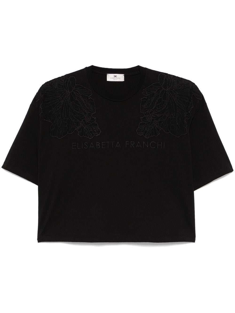 T-shirt nera con ricami semitrasparenti e logo