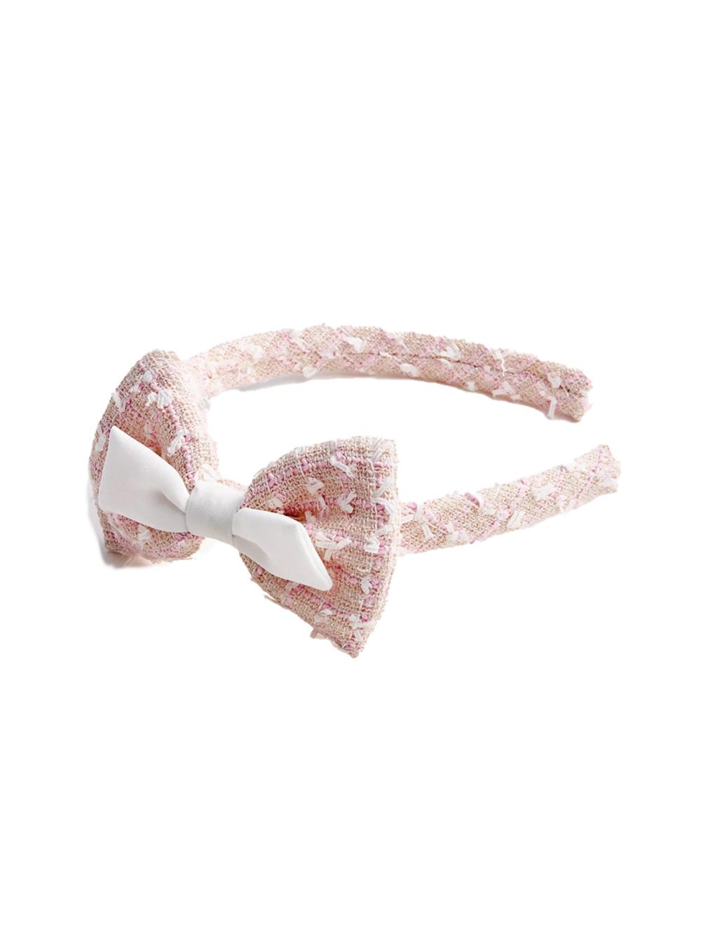 Cerchietto boucle con fiocco rosa