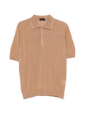 Polo in cotone con ricami traforati