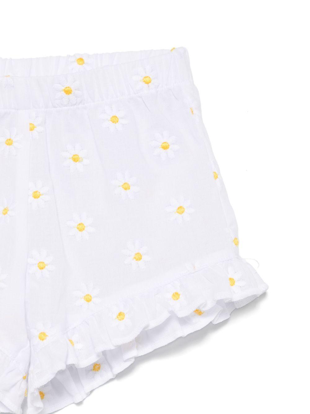 Completo bianco con margherite neonata (2pz)