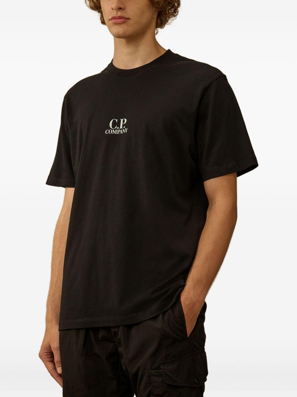 T-shirt Girocollo con Stampa Grafica e Logo 19CMTS106A006586W 999 CP COMPANY 