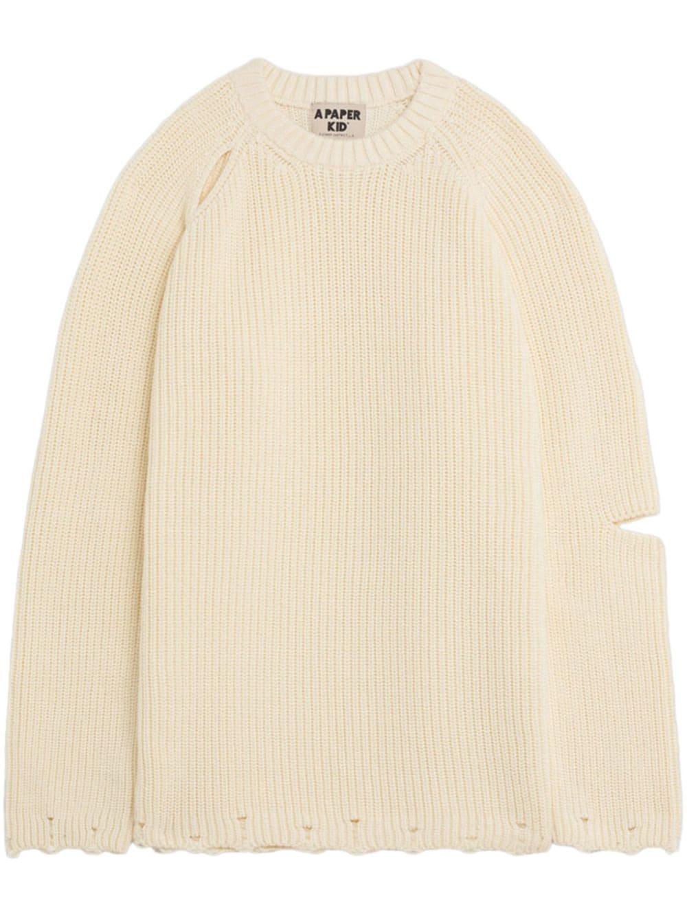 Maglione crema dettagli cut-out