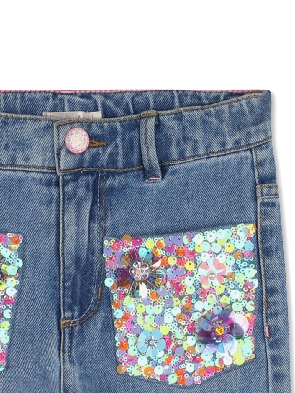 Jeans con tasche in paillettes