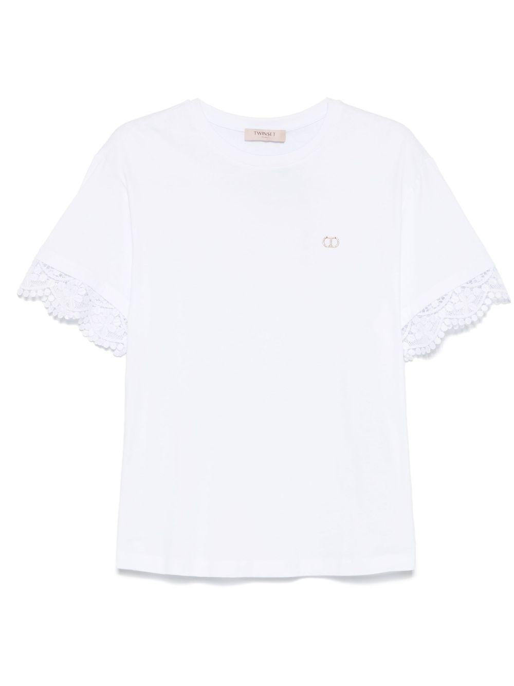 T-shirt  bianca con orli ricamati