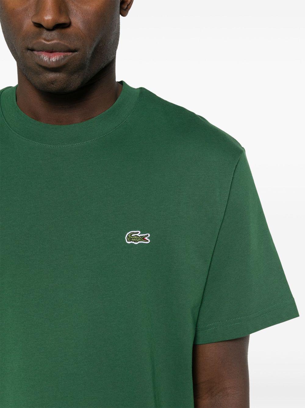 T-shirt in cotone con patch logo TH7318 132 LACOSTE 