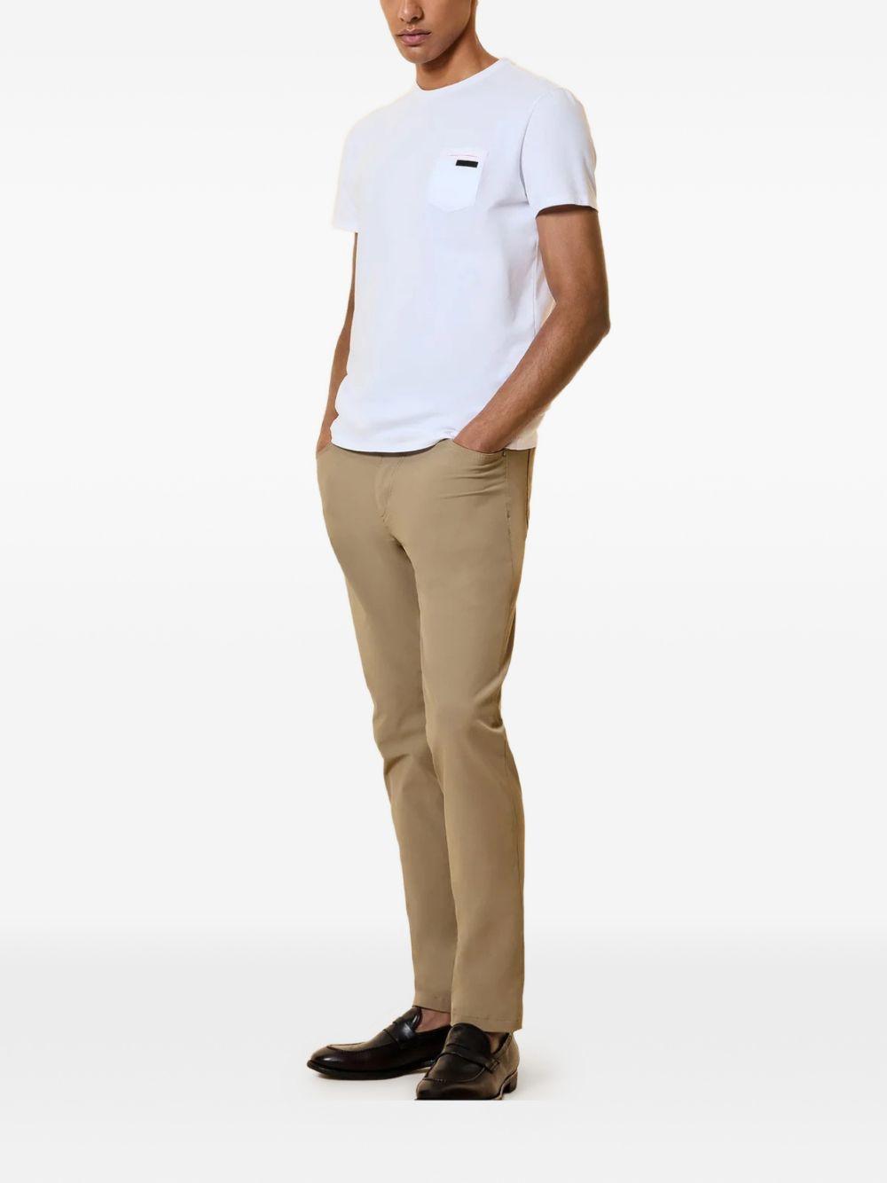T-shirt girocollo con tasca sul petto 26200 09 RRD 