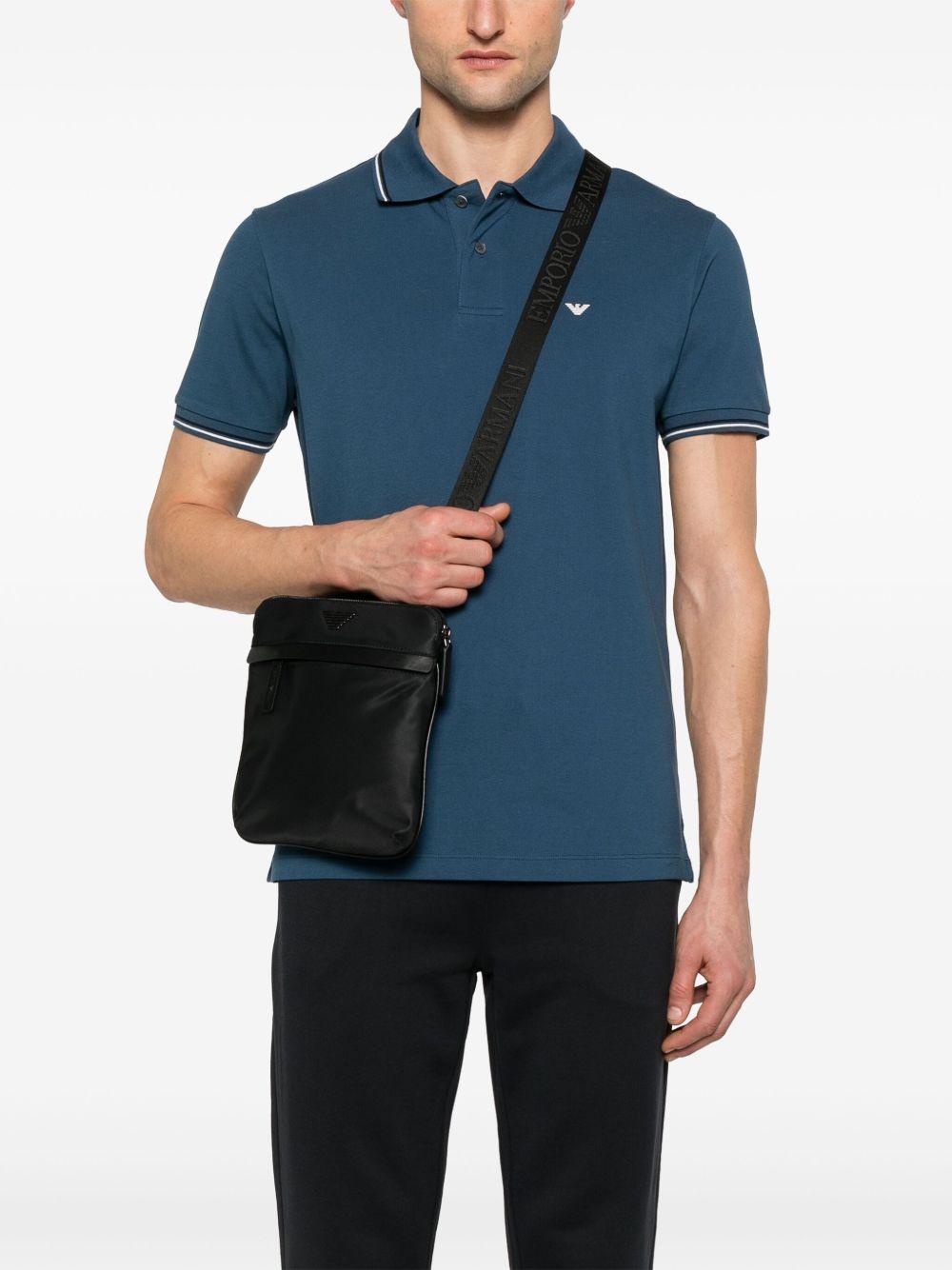 Tracolla nera con logo e chiusura a zip EM001807AF13454 UC001 EMPORIO ARMANI 