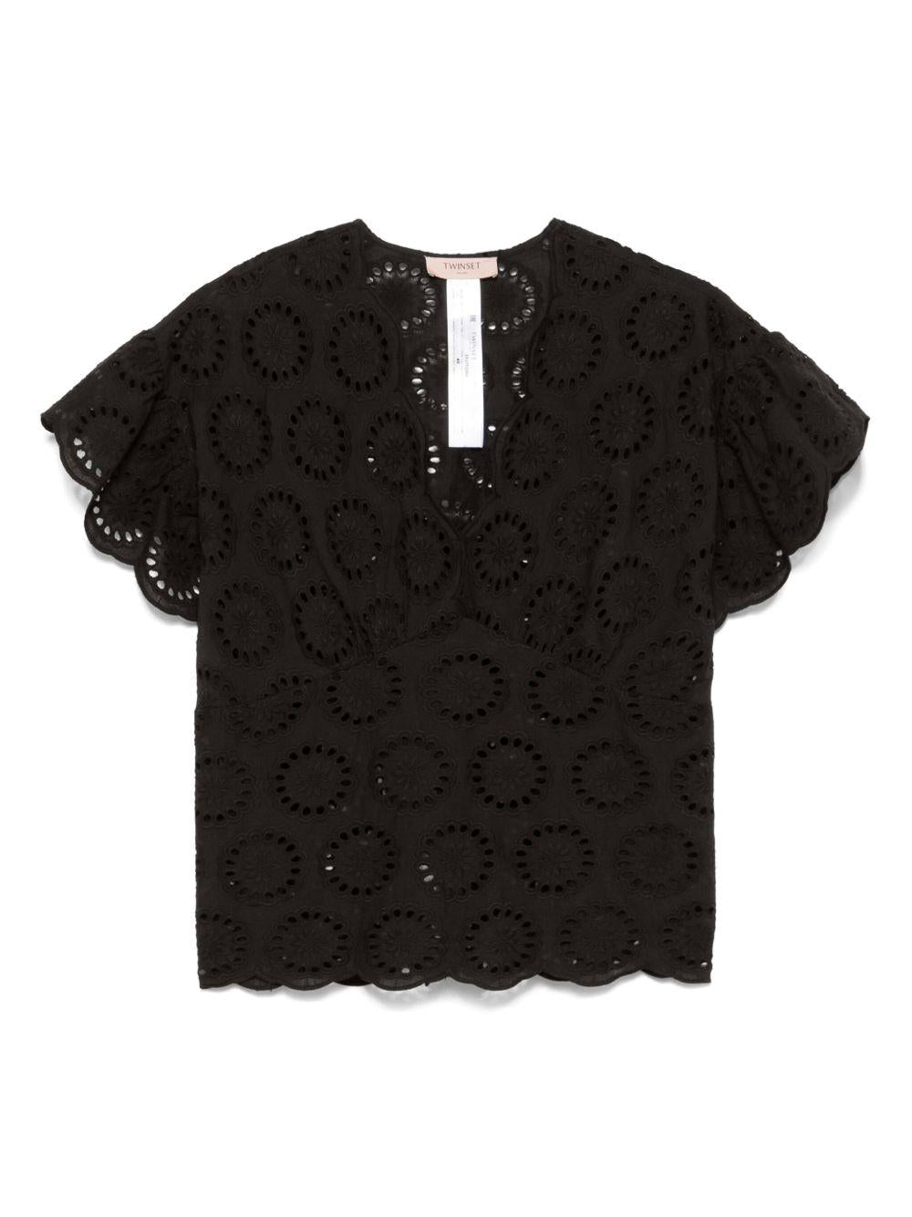 Blusa nera in pizzo sangallo