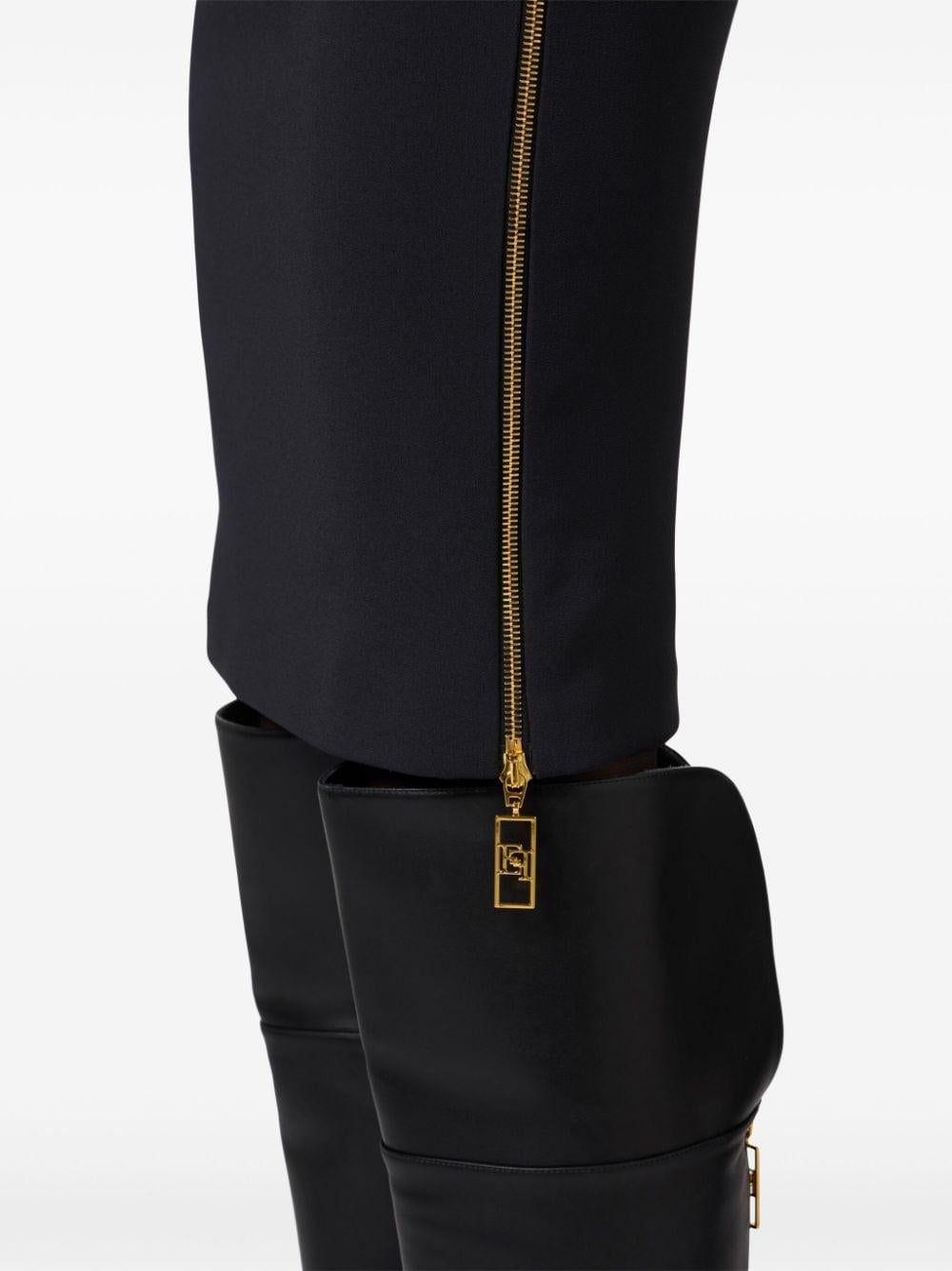 Gonna midi nera con zip lateali