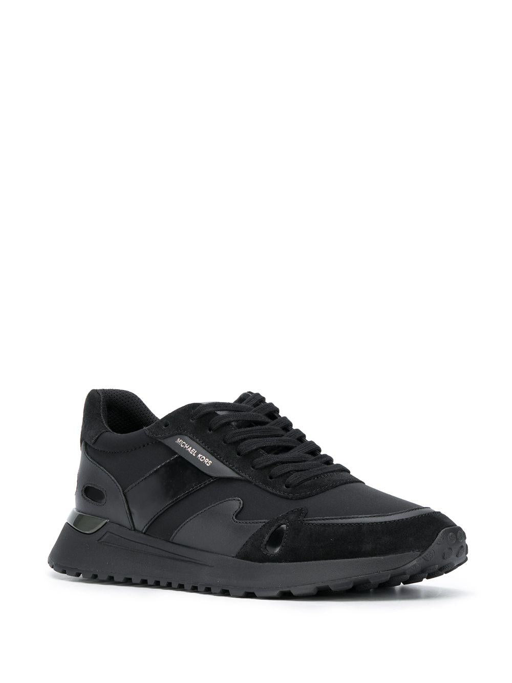 Sneakers nera inserti in pelle e tessuto