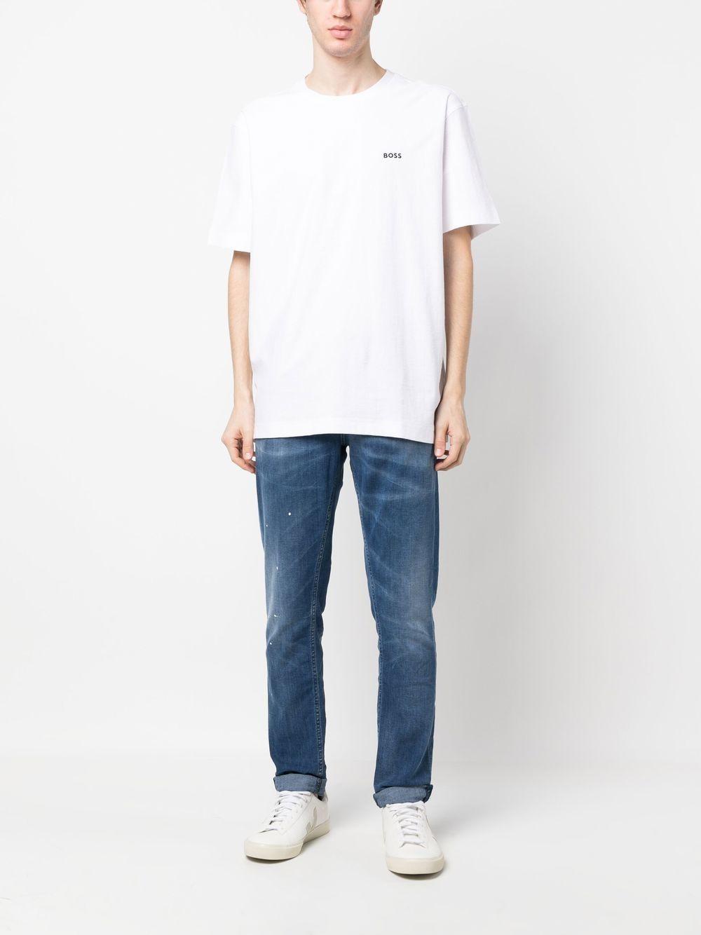 Jeans blu con schizzi di pittura UP232DS0145UFO4DUS23 800 DONDUP 