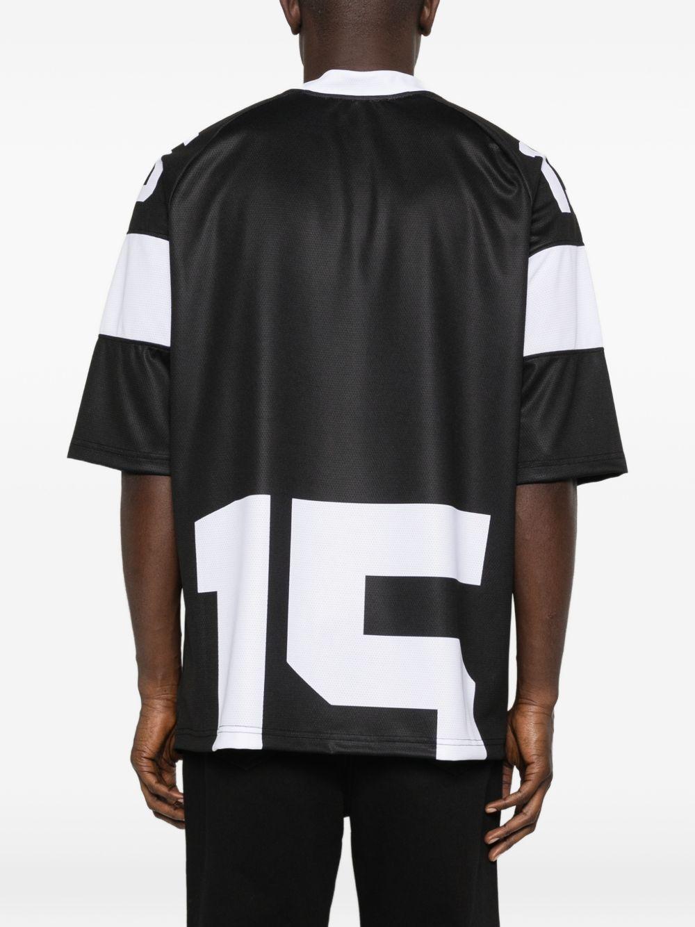 T-shirt in poliestere con stampa grafica scollo a V NUS26231 520 IH NOM UH NIT 