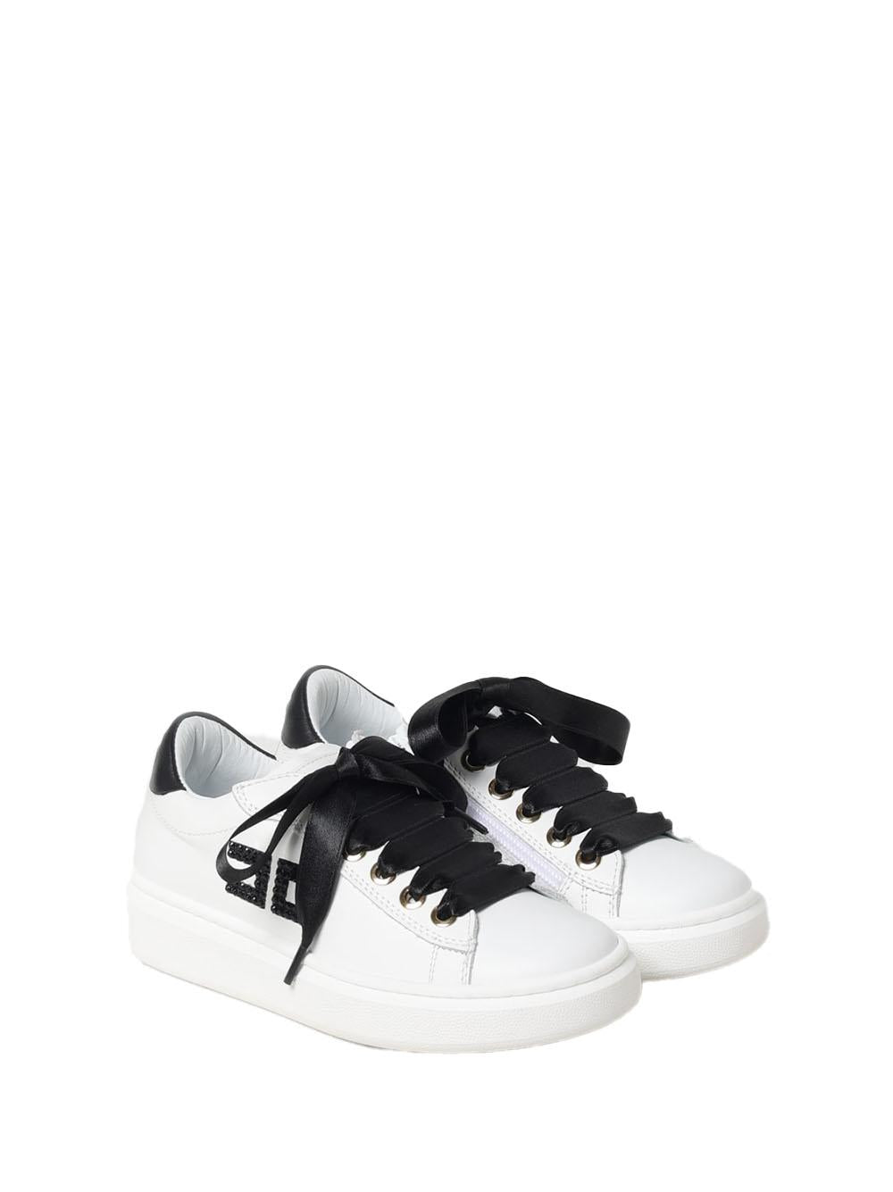 Sneakers bianche con lacci in raso neri