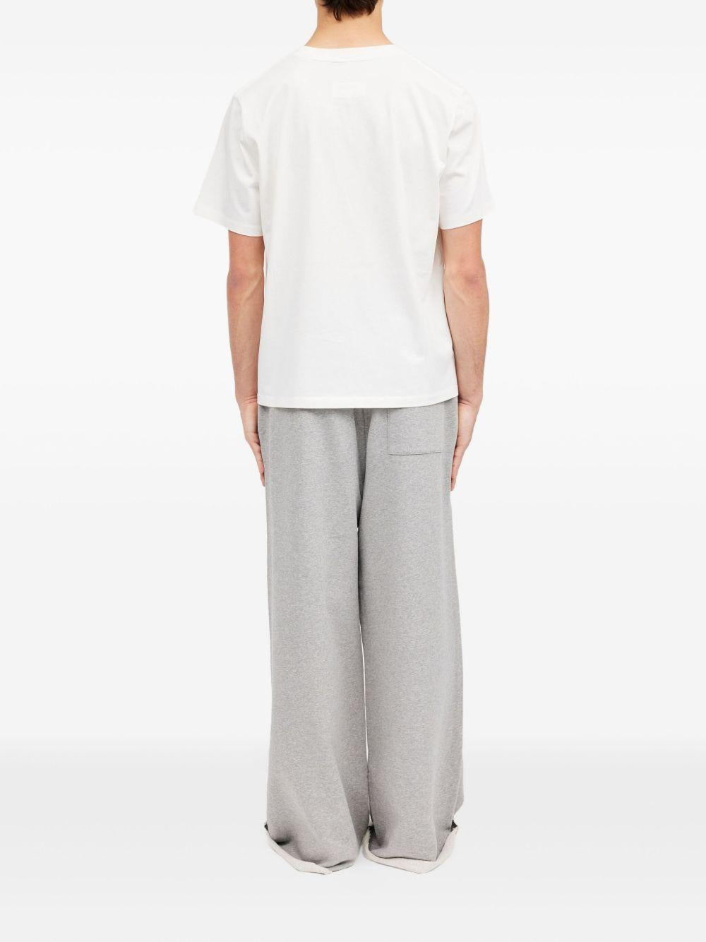 T-shirt in cotone con patch applicate SH0GC0069S24311 101 MM6 MAISON MARGIELA 