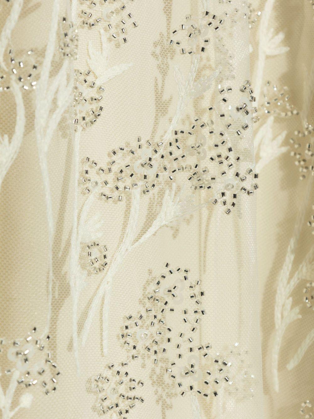 Abito crema in tulle e macramè