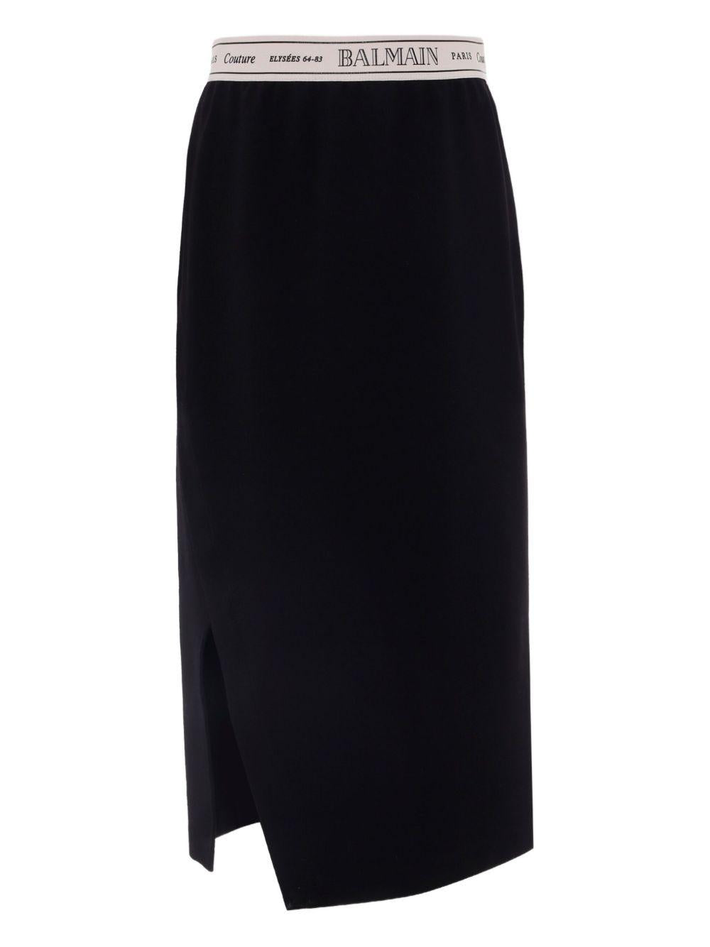 Gonna Bambina in Jersey Nero con Logo e Spacco Laterale BX7A34J0371 930AV BALMAIN KIDS 