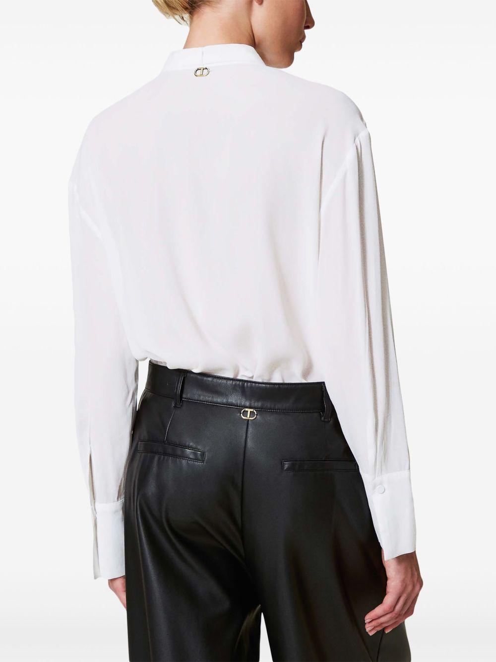 Camicia bianca con ricami