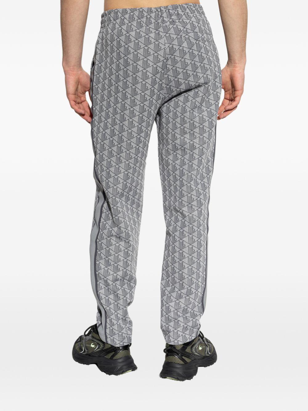 Pantaloni track con motivo all-over e banda laterale XH1440 41I LACOSTE 