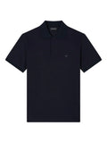 Navy blue polo shirt with logo and zip fastening