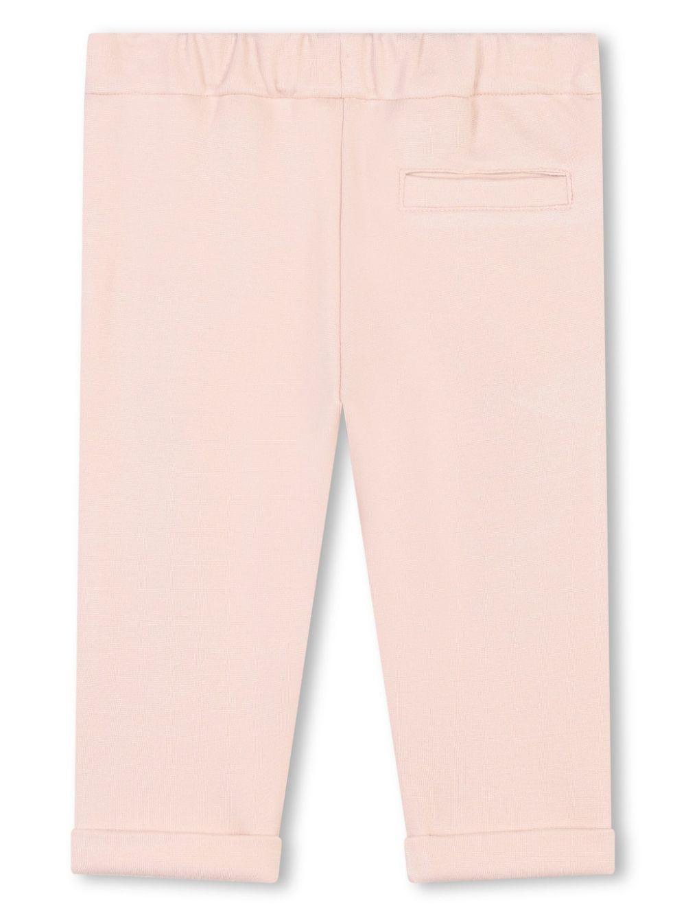 Pantalone rosa neonata tasche a smerlo