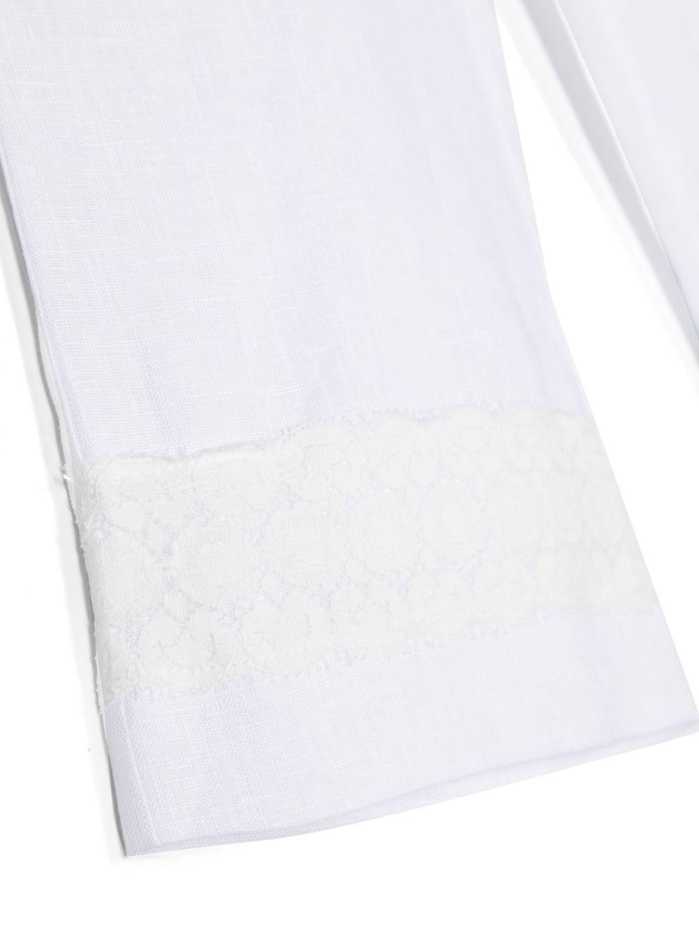 Pantalone bianco neonata orlo ricamato lino