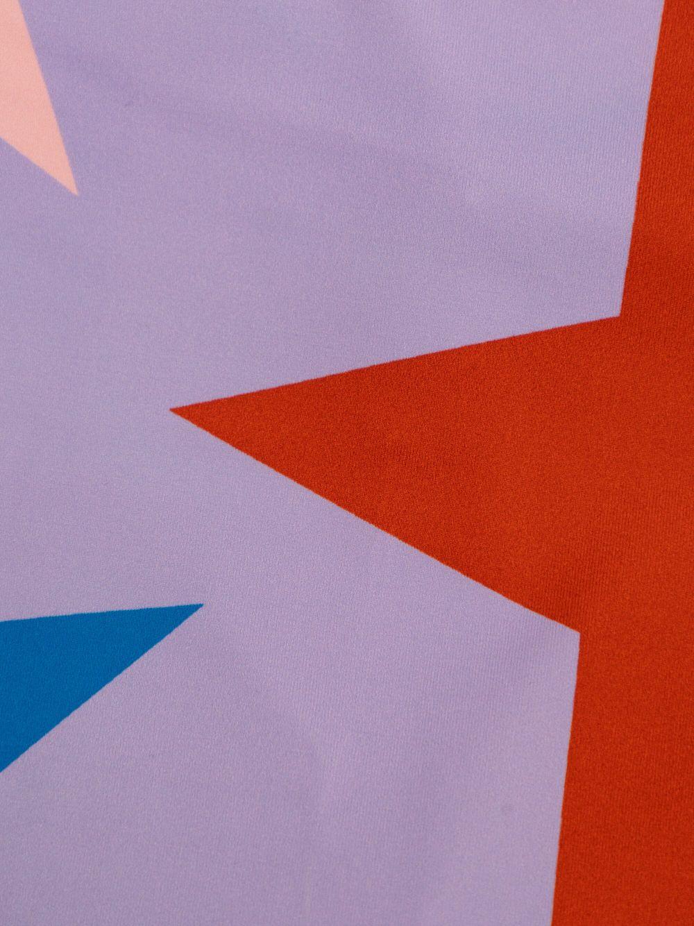 Abito lilla con stelle e tulle