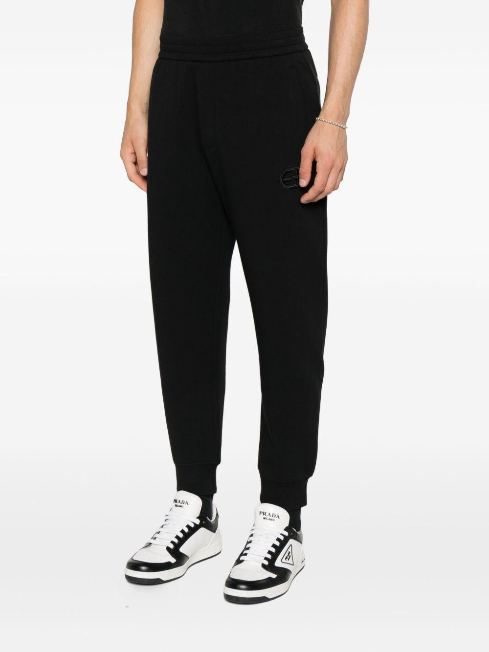 Pantaloni neri da tuta con logo ricamato e polsini 8N1PT01JHSZ UC001 EMPORIO ARMANI 