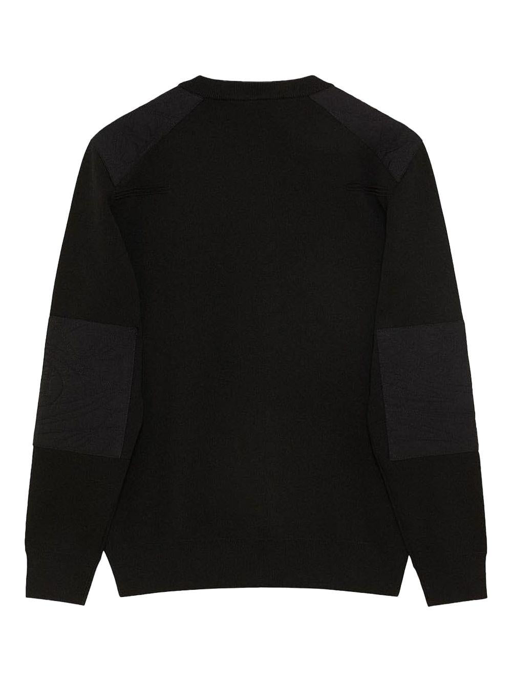 Maglione nero con taschino