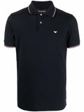 Polo blu con profili a righe