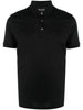 Black polo shirt with mini chest logo