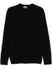 Maglione nero con lavorazione bouclè
