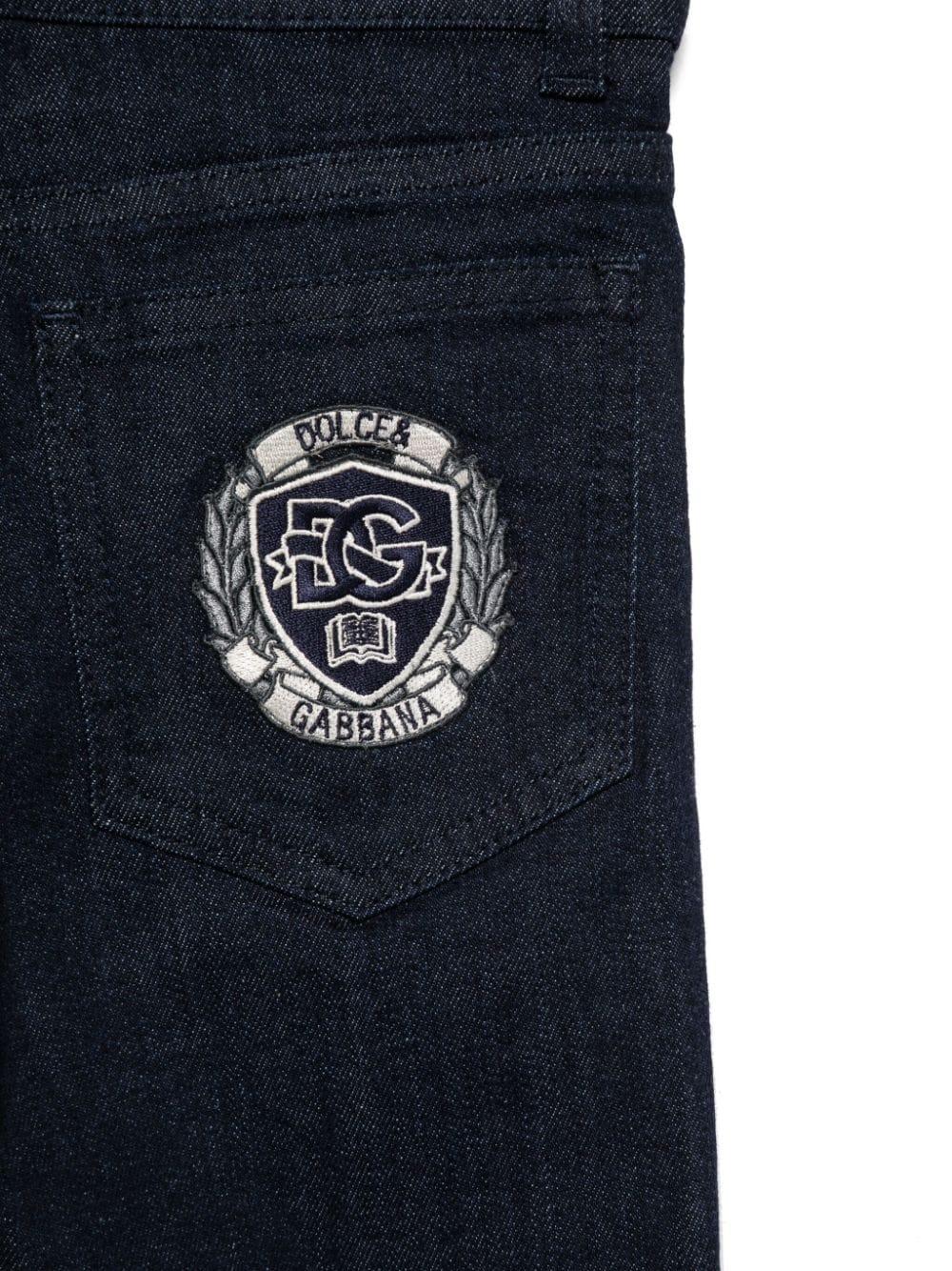 Jeans blu scuro cinque tasche logo ricamo retro