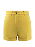 Shorts in poliestere senape con risvolto
