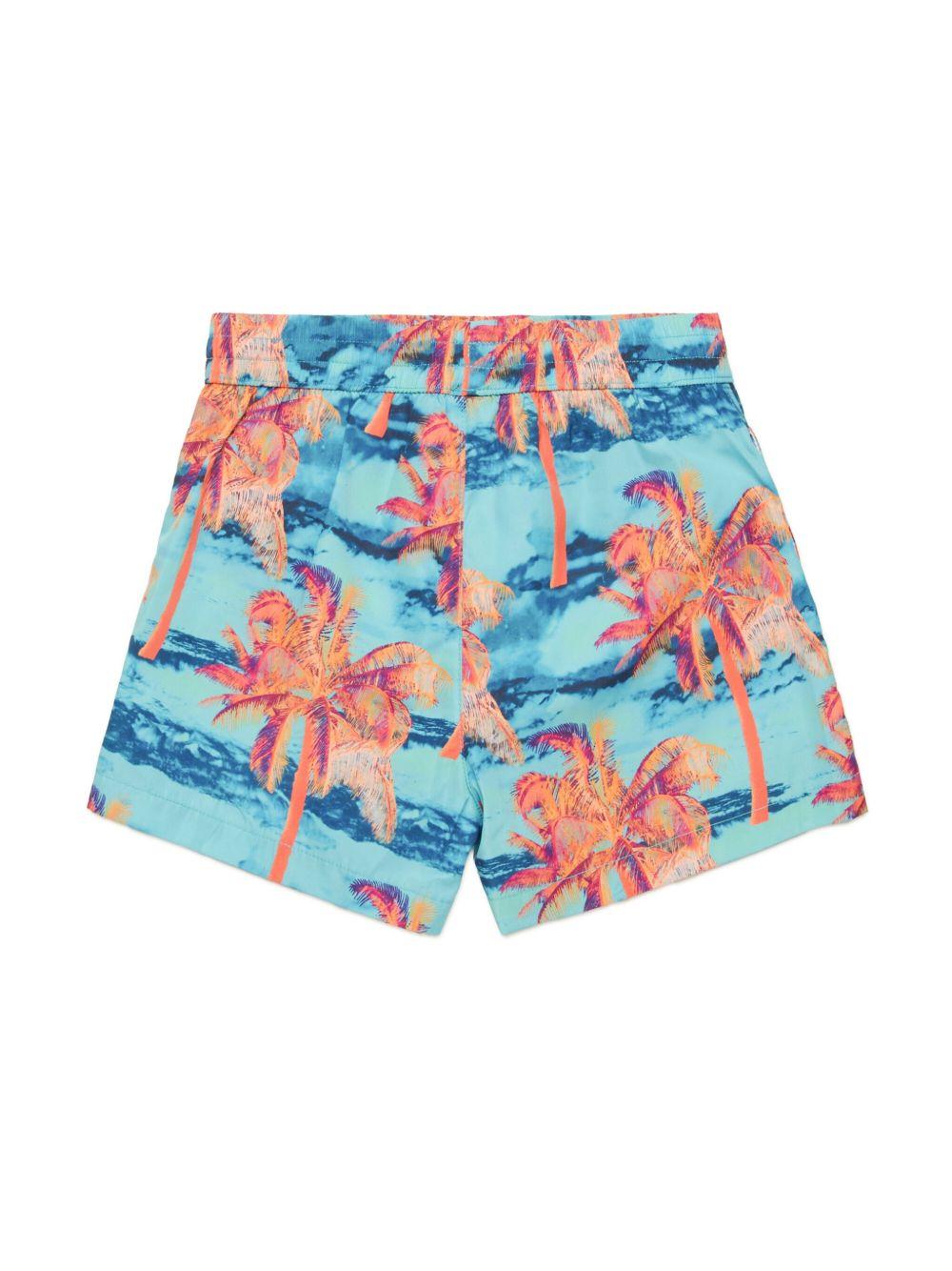 Costume azzurro con fantasia stampata palme