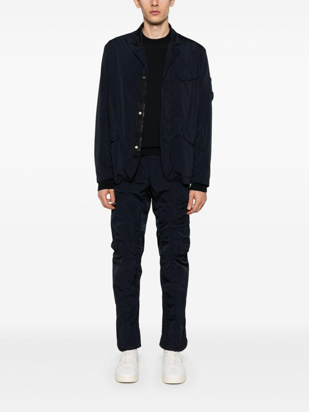 Maglione in filo blu logo lens sul braccio