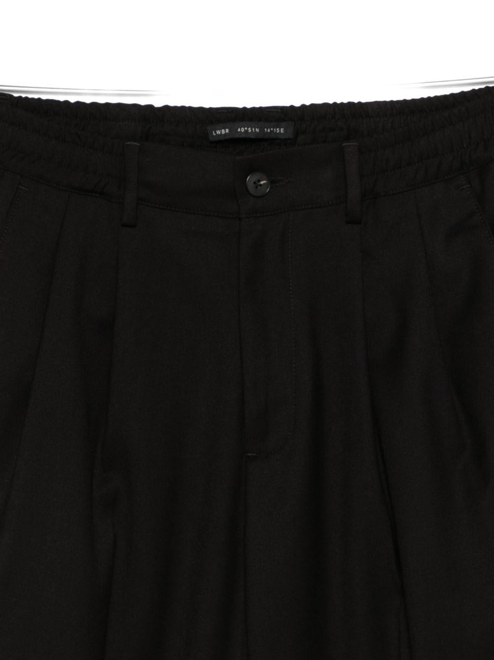 Pantaloni neri a gamba ampia con pieghe L1PFW25266968 D001 LOW BRAND 